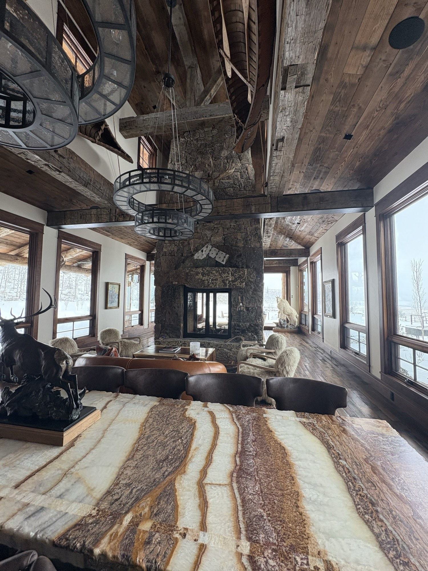 Finished timber and stone great room completed by our crew